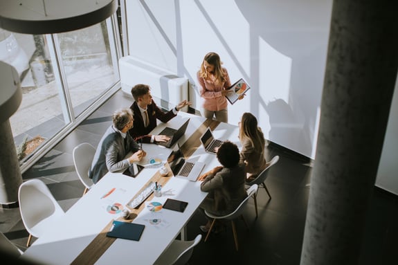 Business leaders in a meeting discussing strategy